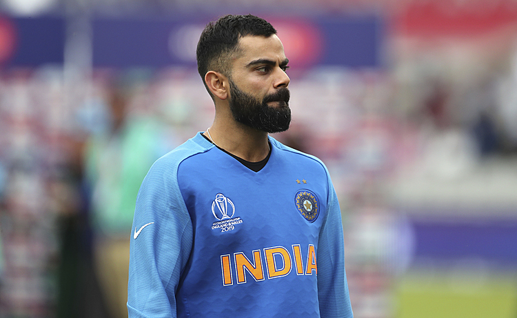 The Latest: Kohli praise for NZ 'outstanding' bowlers