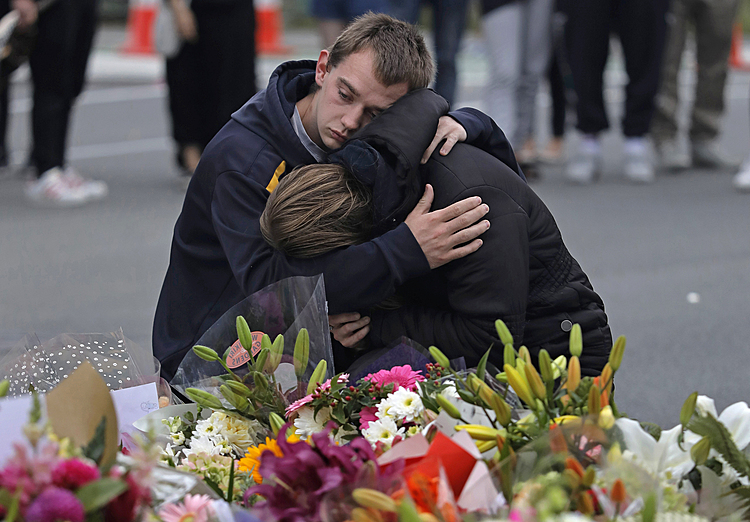 AP Photos: Heartbroken New Zealanders mourn mass shooting