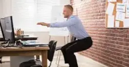 5 Easy Exercises to do at Your Desk to Ease Aches and Pains