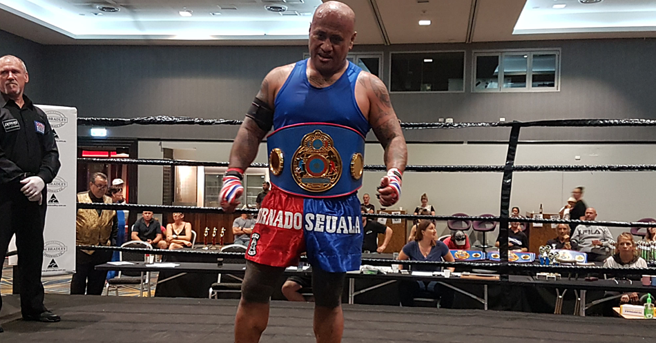 Boxing champ hopes to honour parents with title belt