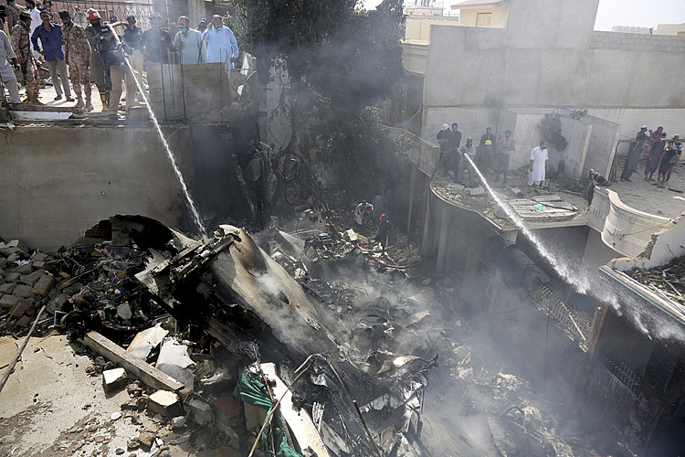 Pakistan jet with 98 aboard crashes near Karachi airport