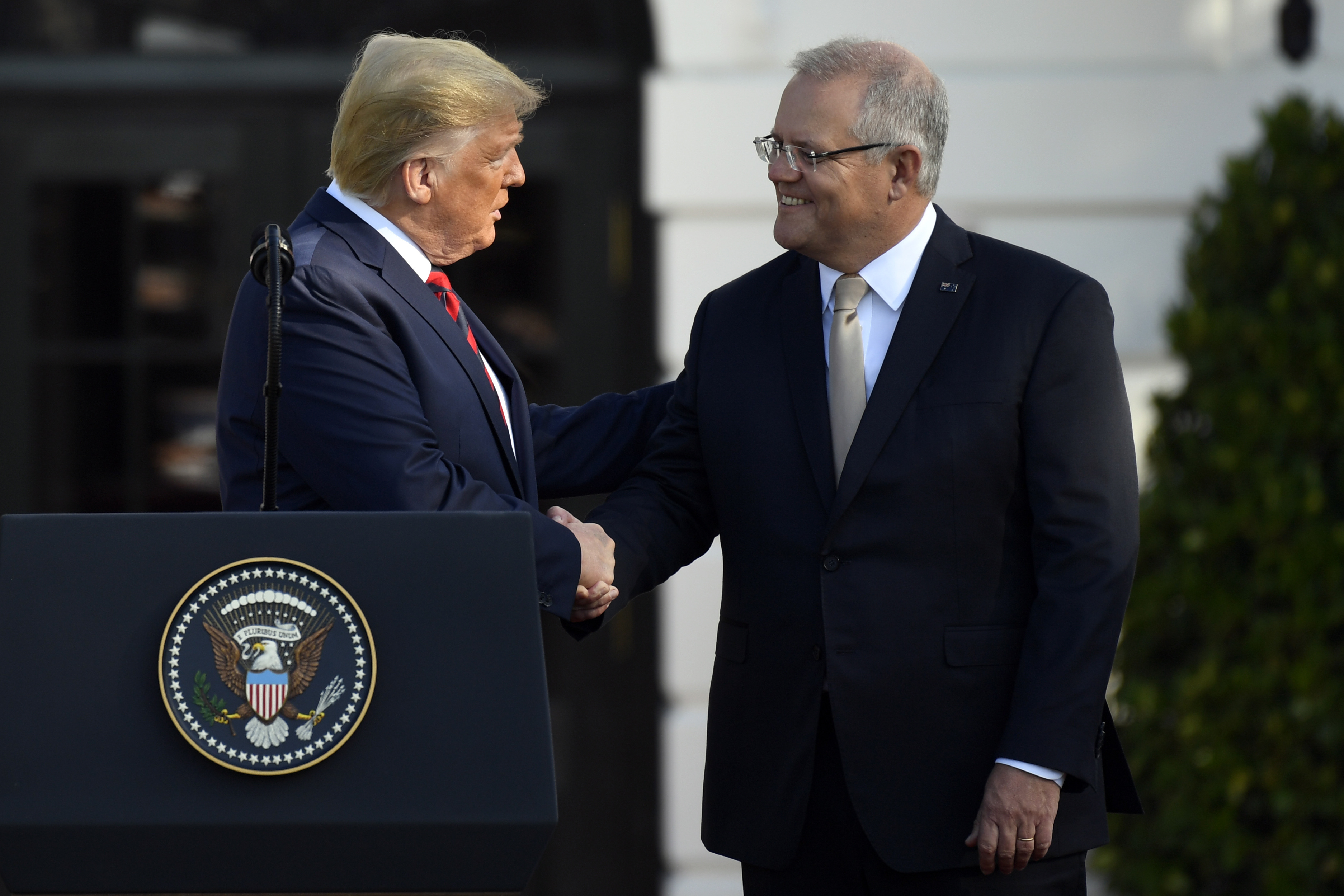 The Latest: Trump wants to attend Australia golf tournament