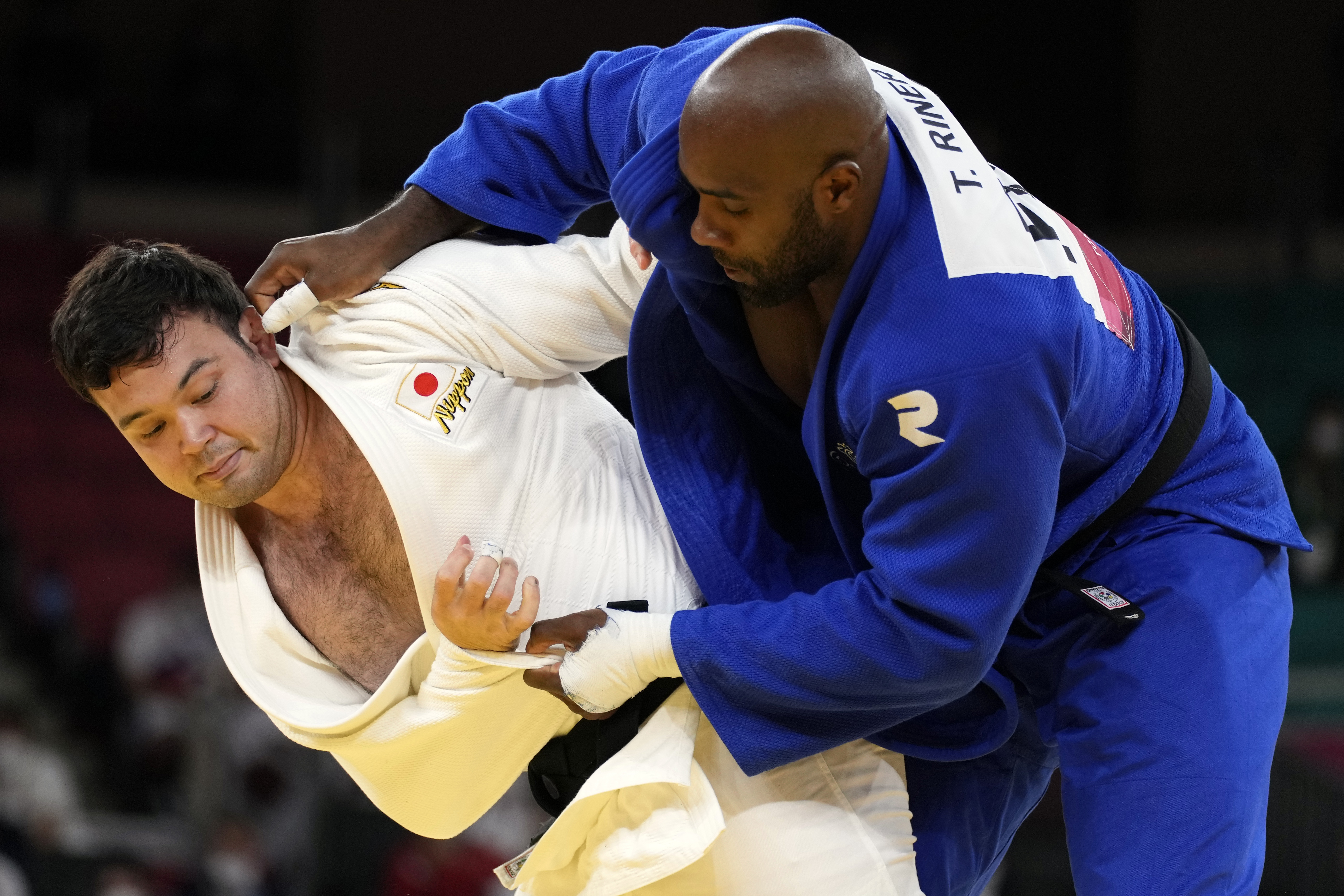 Olympic Latest: France beats Japan for mixed team judo gold