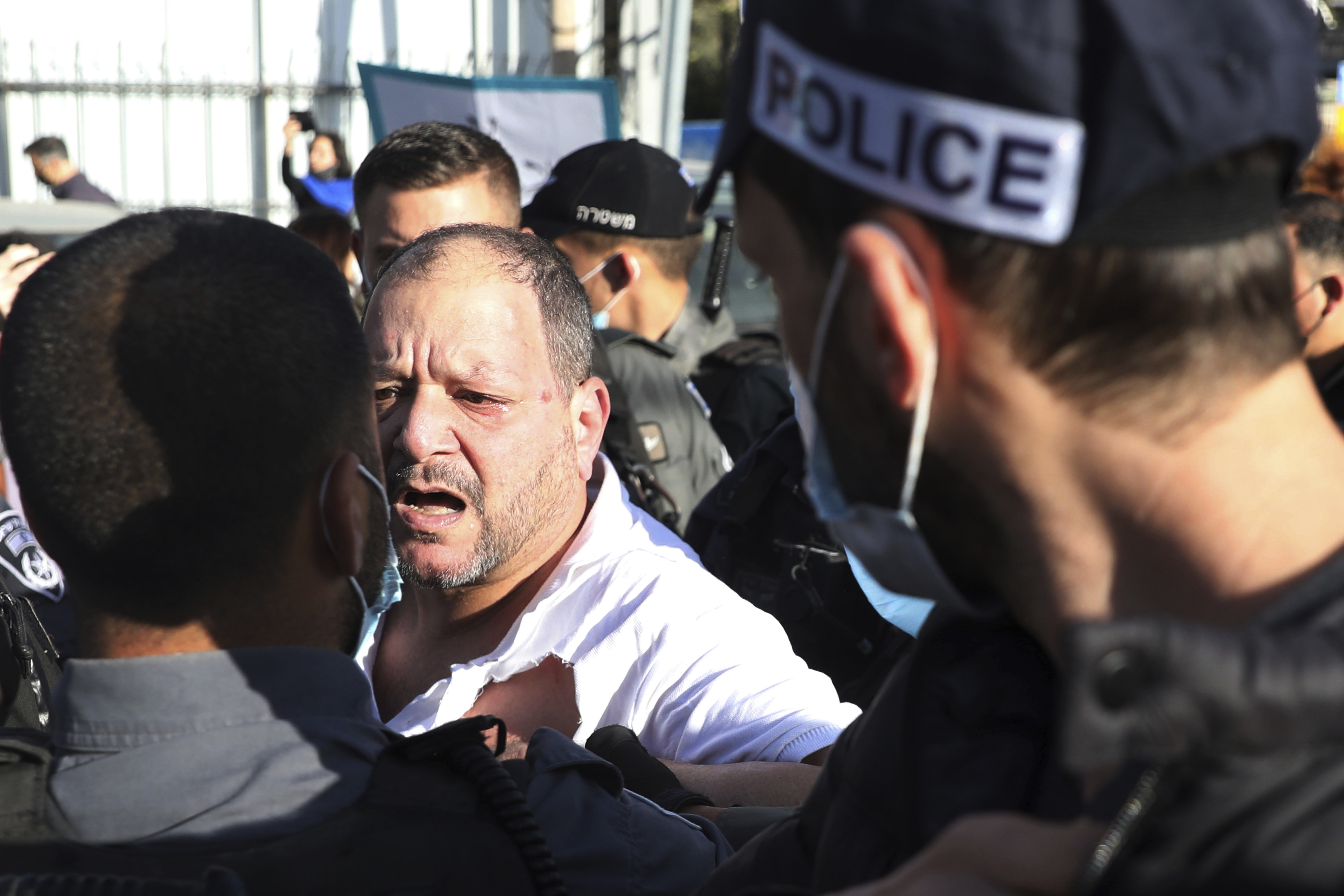 Video shows Israeli police beating lawmaker at protest