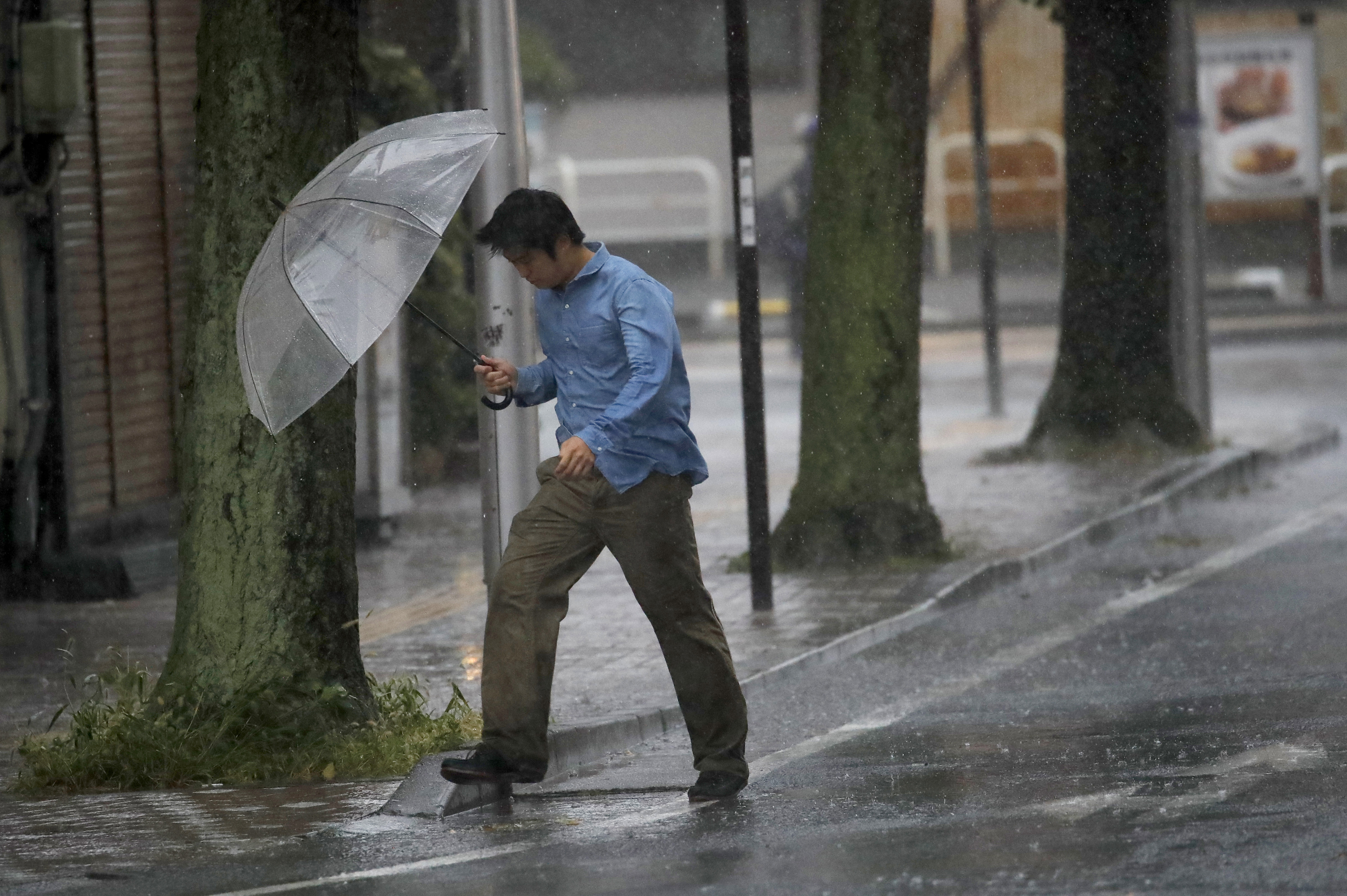 The Latest: Powerful typhoon reaches greater Tokyo area