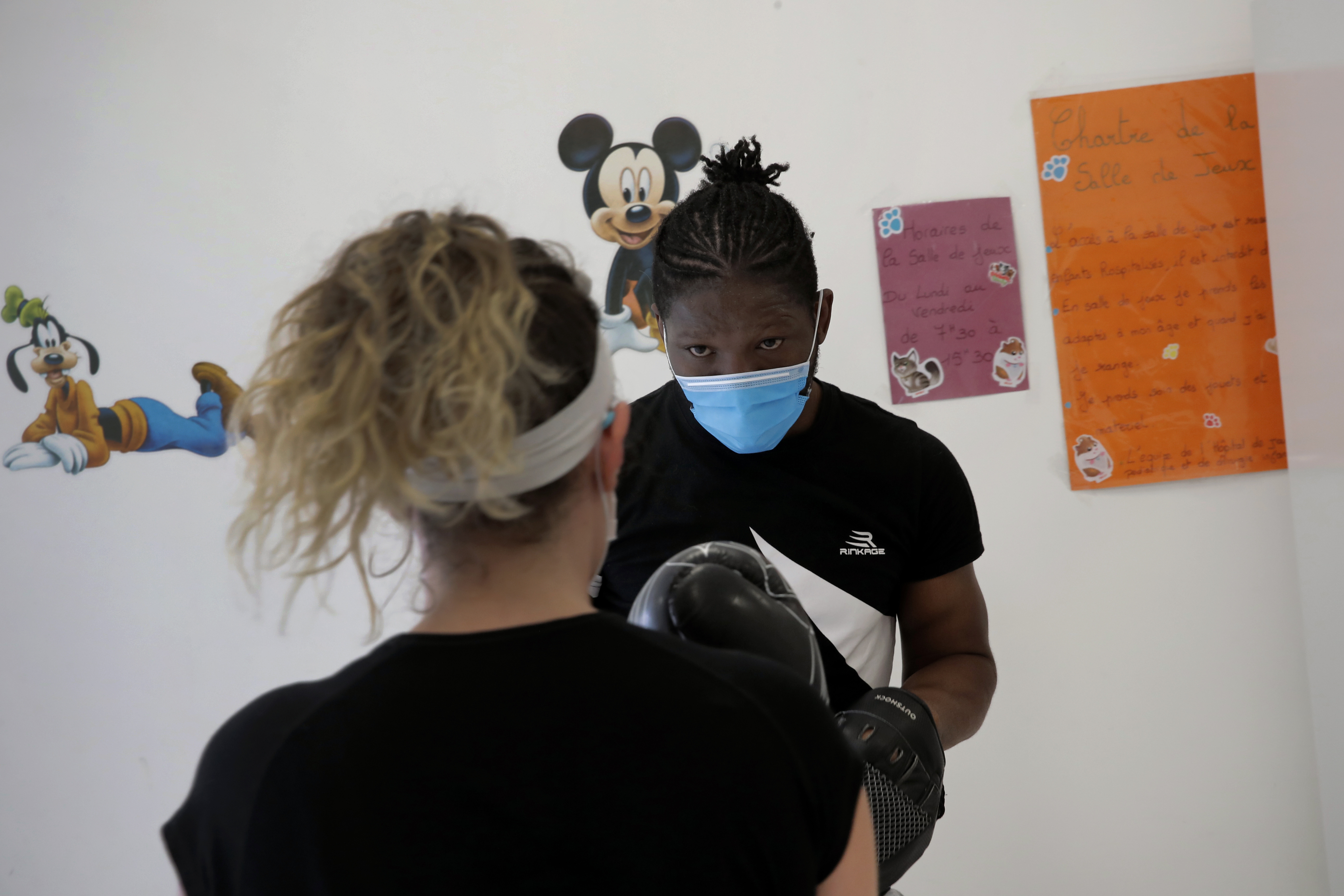 Punching through turmoil: Pro boxer helps medical staff cope