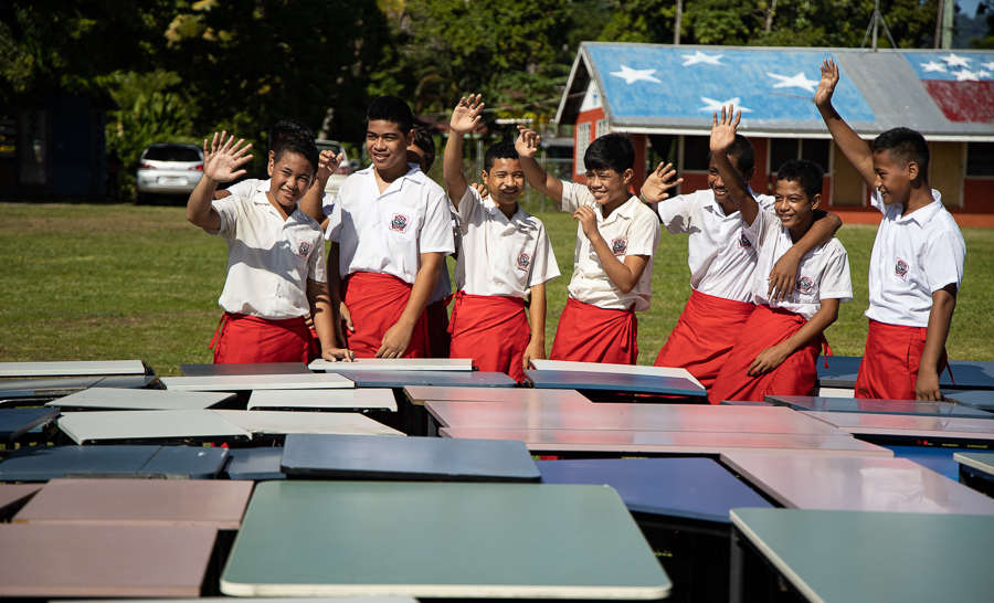 Church aids school with desks and chairs