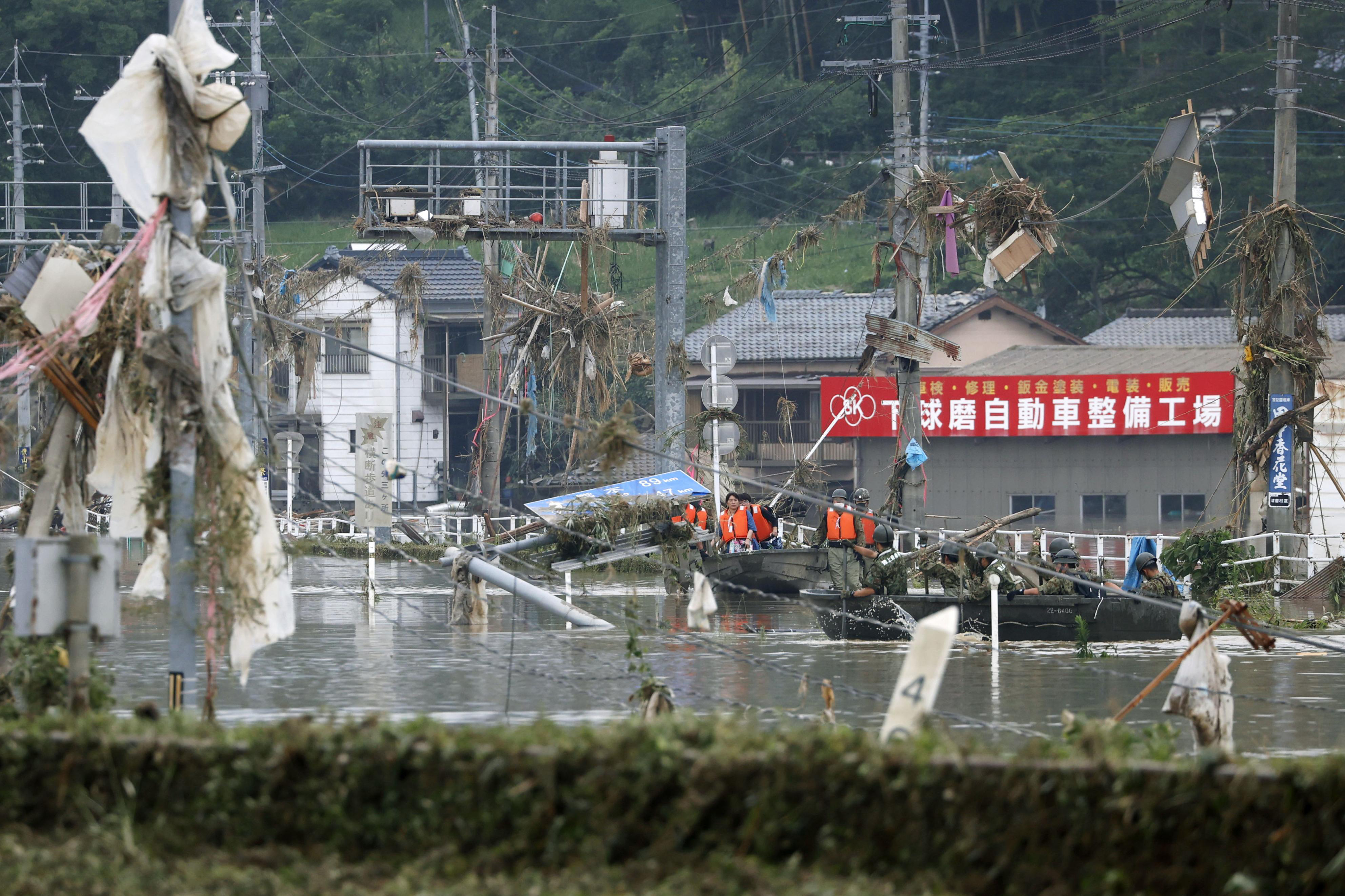 Japan floods leave some 20 dead, many in nursing homes