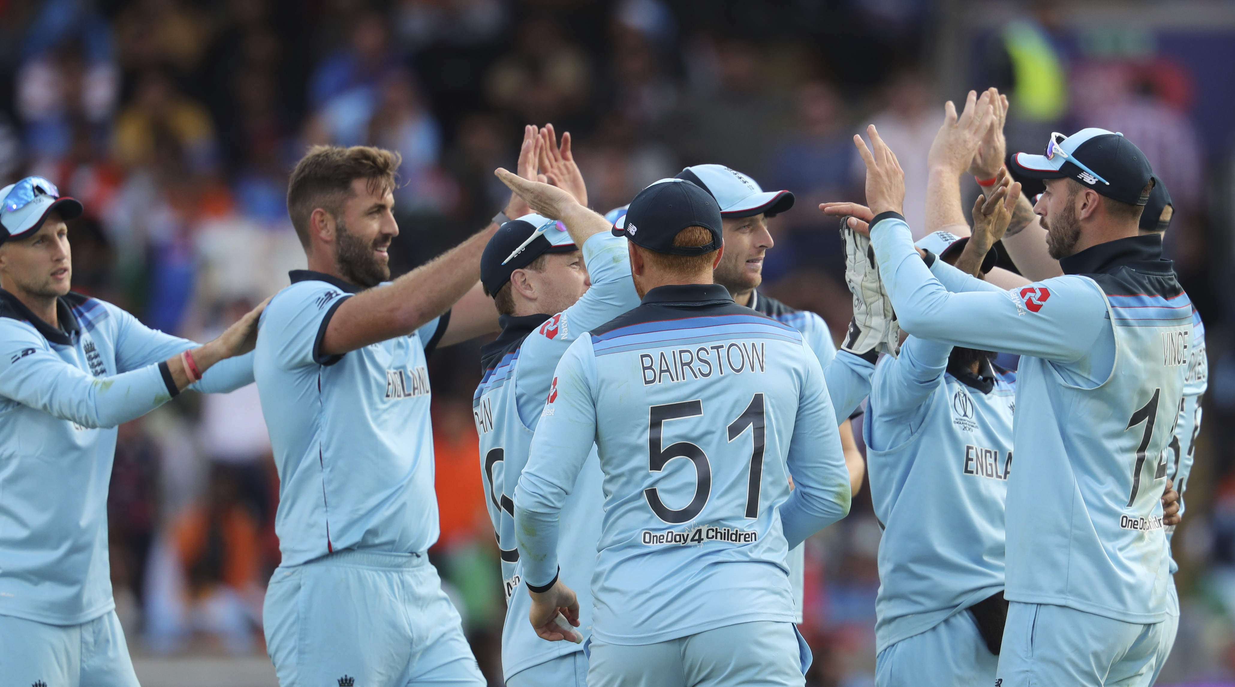 The Latest: England beats India to revitalize Cup campaign