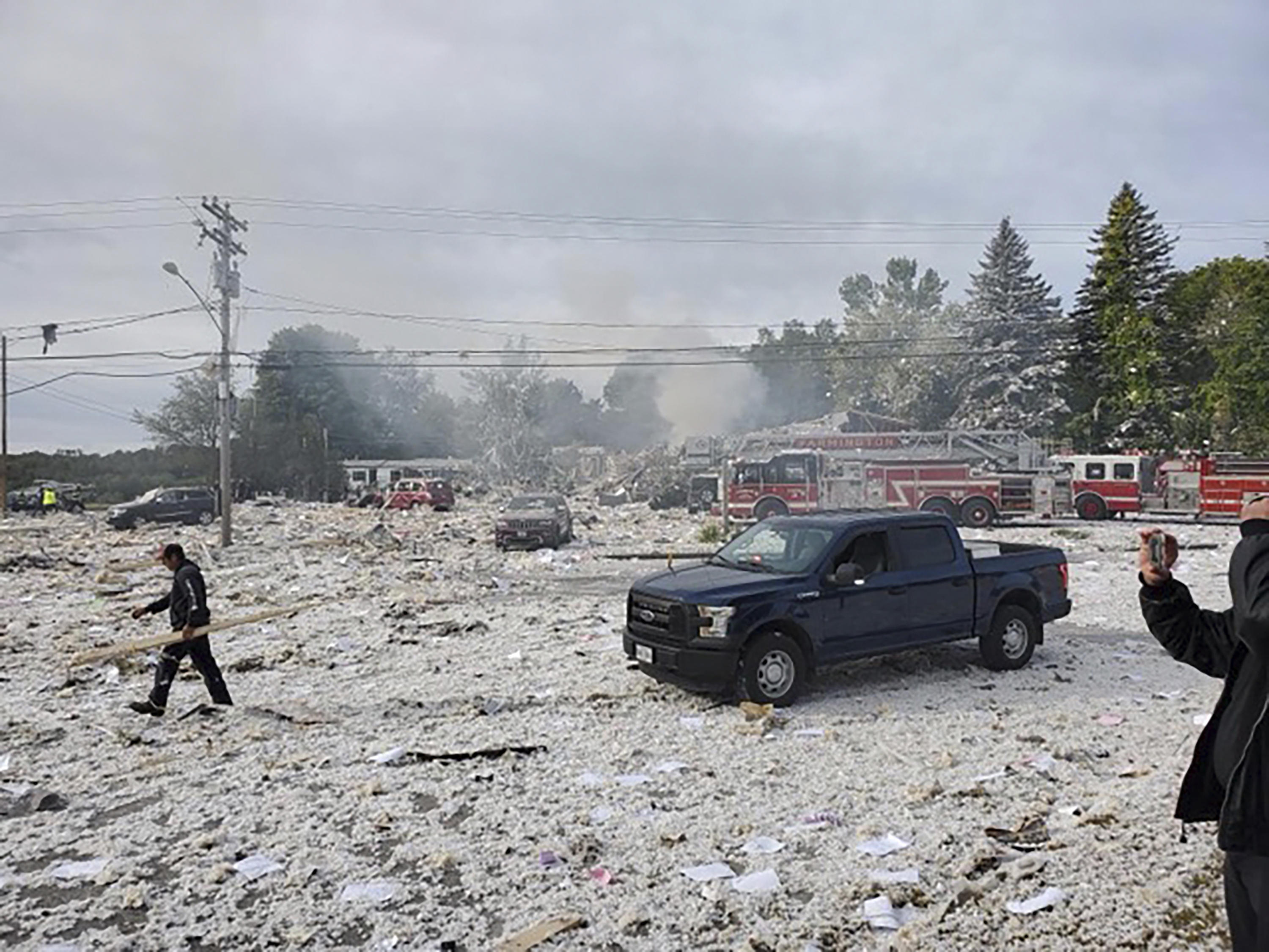 Propane explosion kills firefighter, injures 6 other people