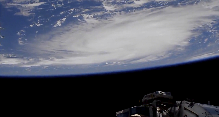 The Latest: Dorian strengthens to Category 2 storm