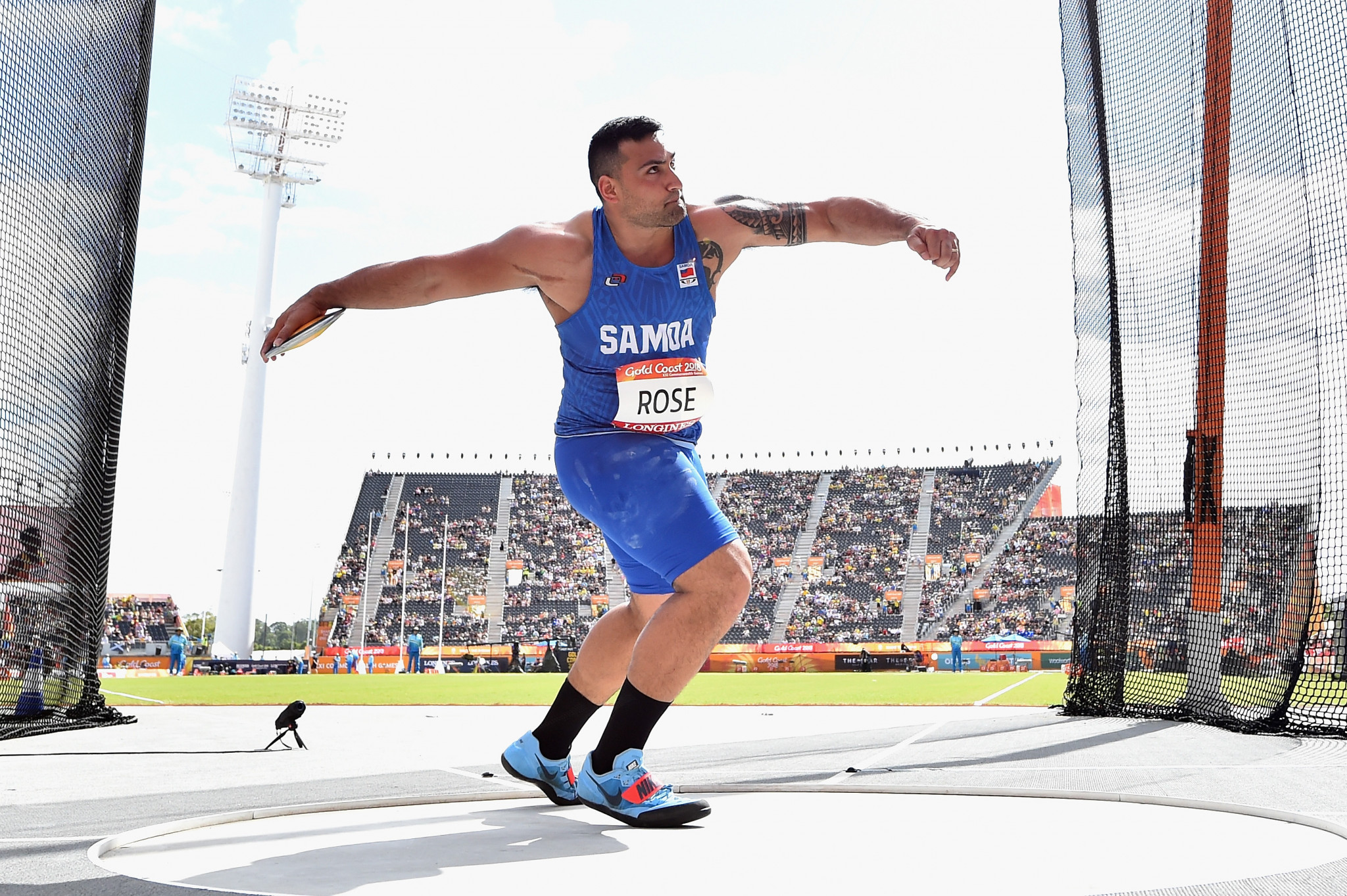 Samoan discuss thrower makes history in Oregon
