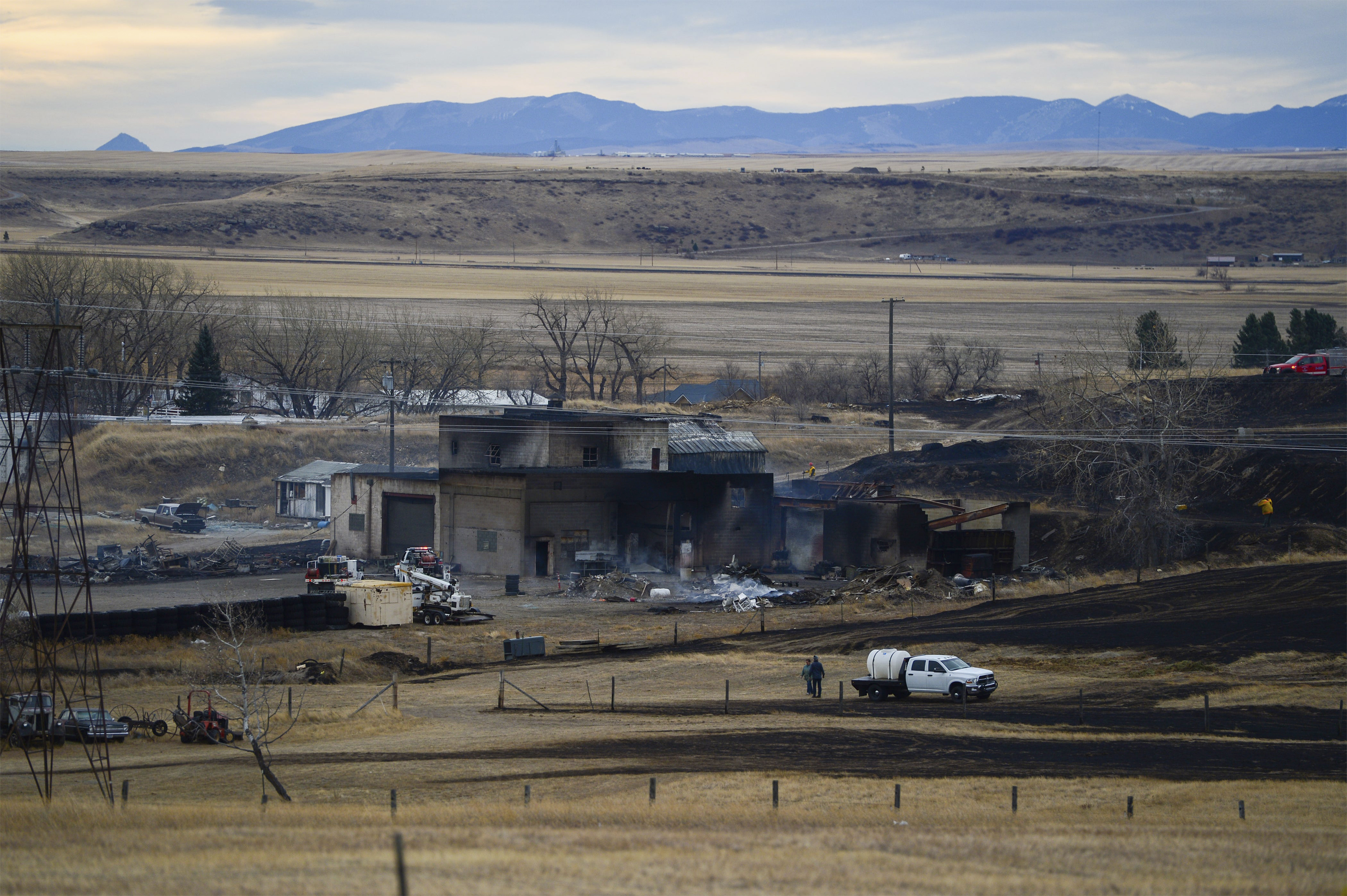 Wildfire burns into central Montana town, destroys houses