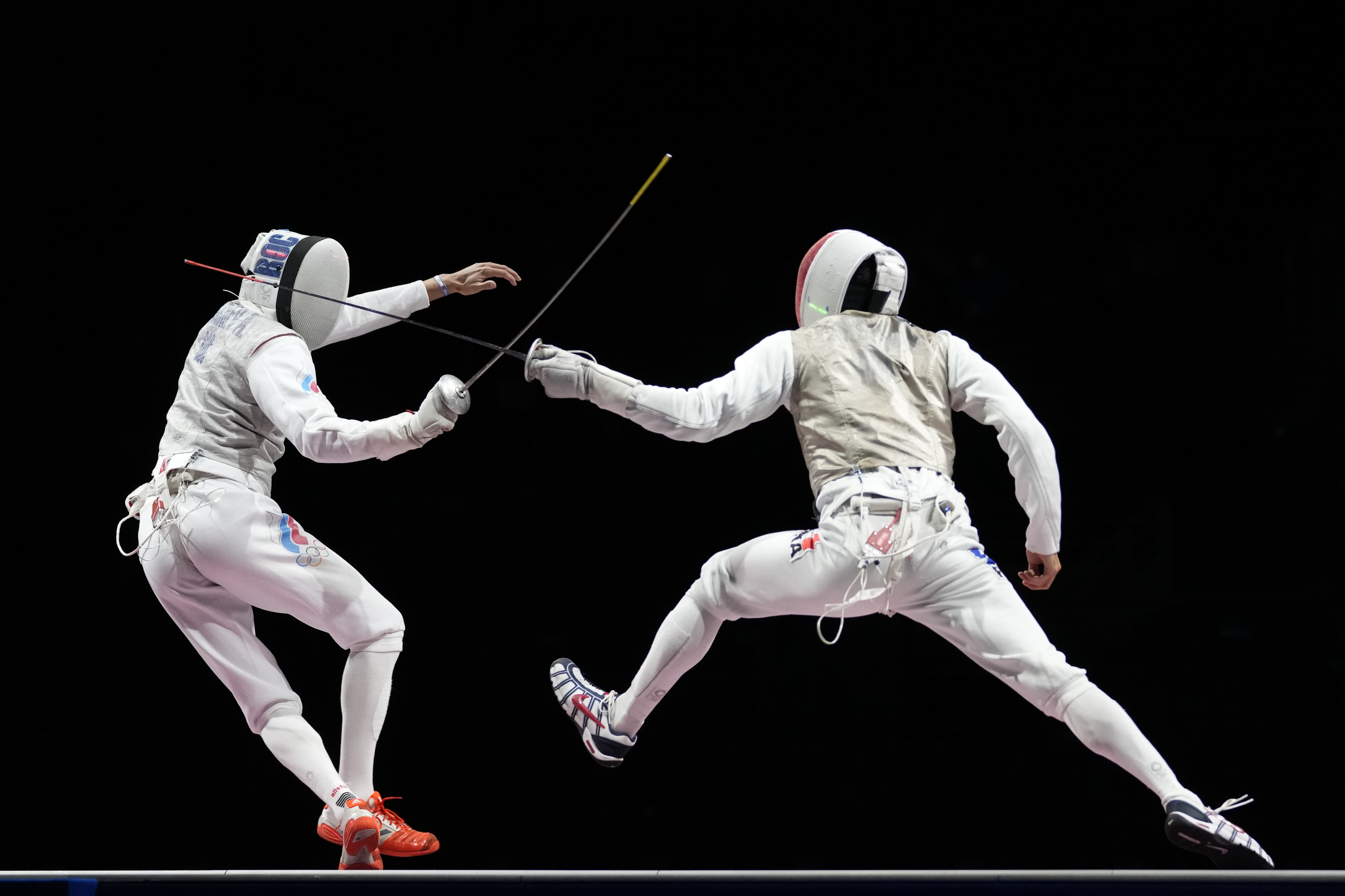 Olympics Latest: France beats Russians for team foil gold