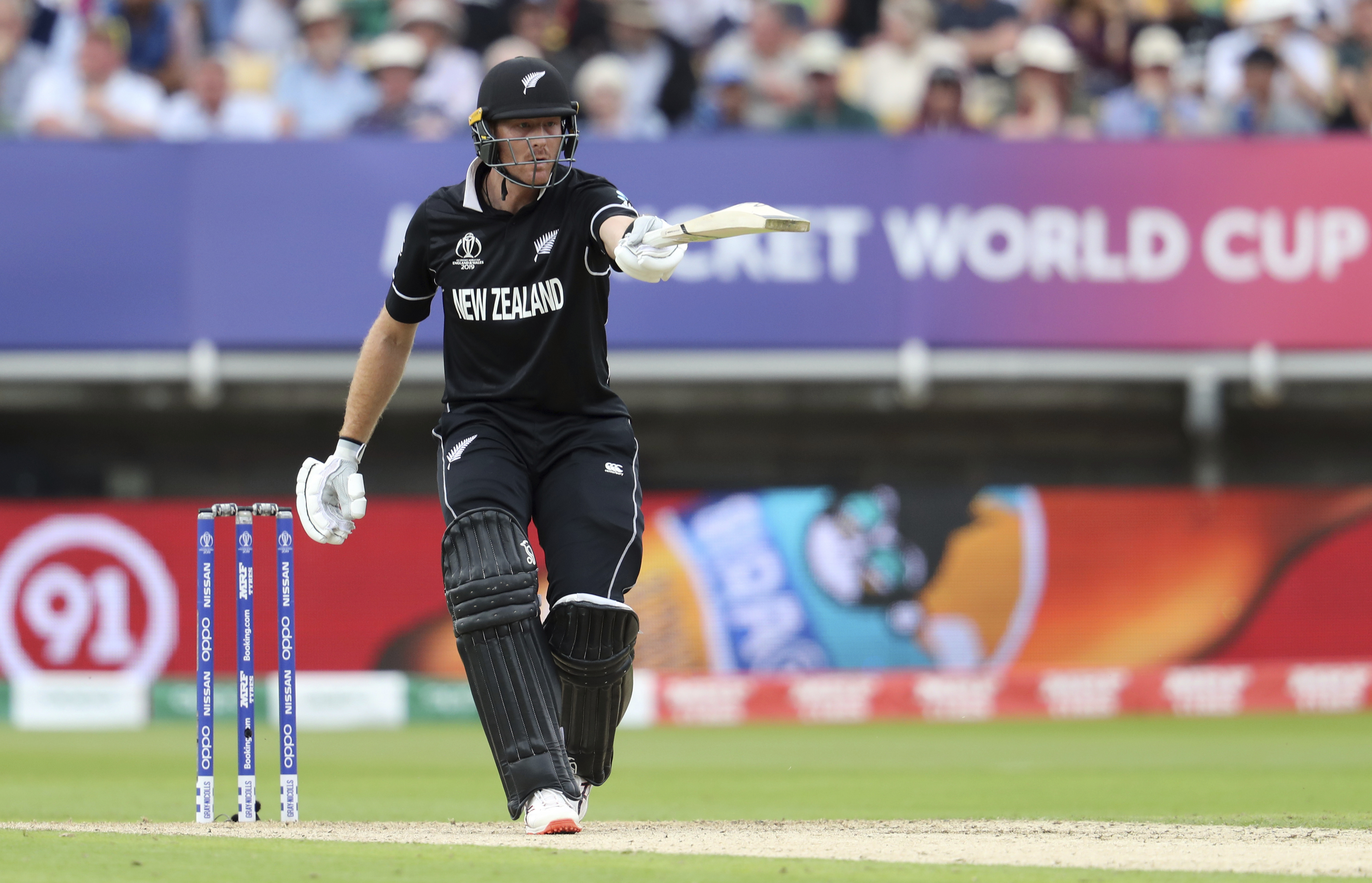 The Latest: South Africa strikes gold as Guptill hits wicket