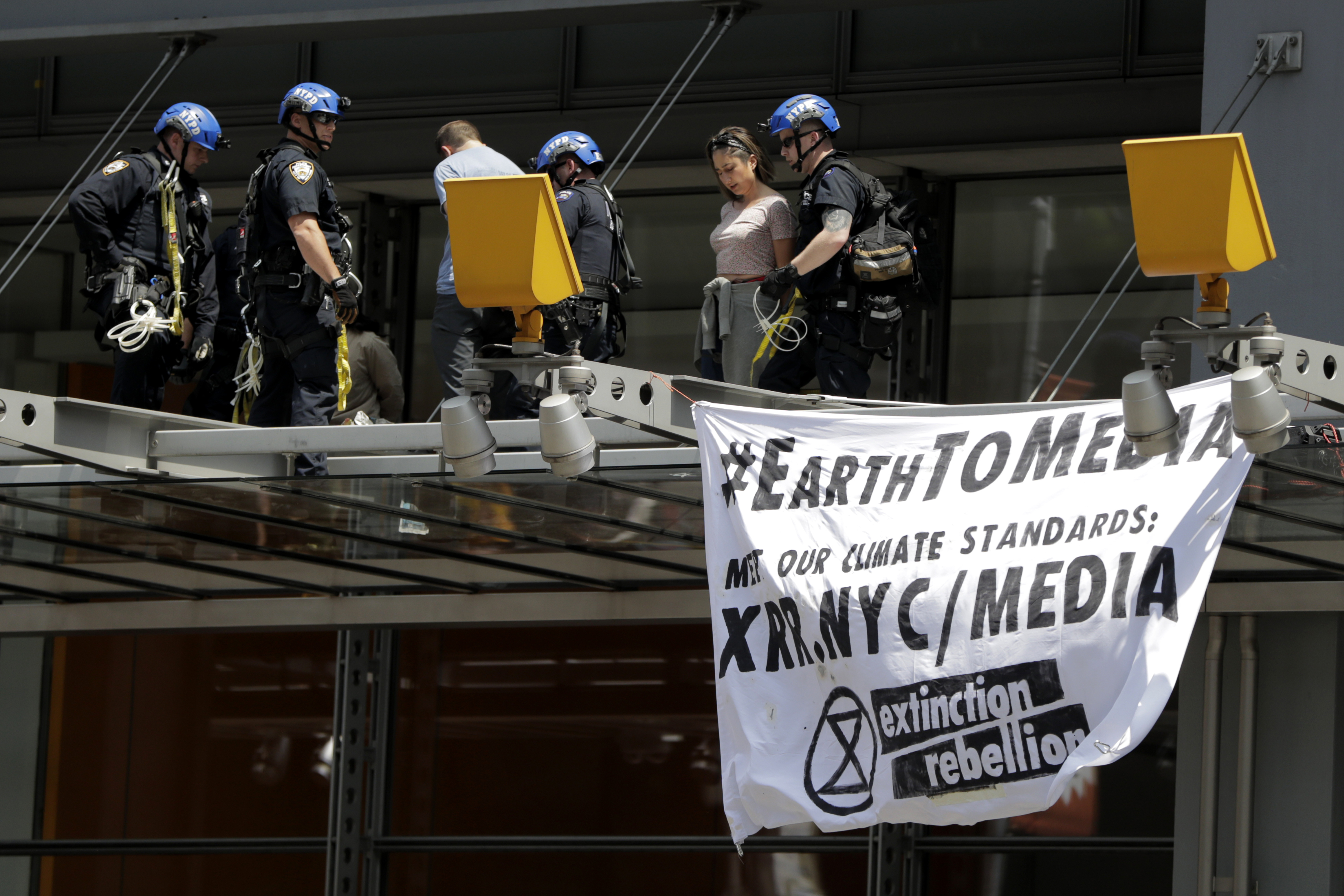 Climate change protesters arrested outside New York Times
