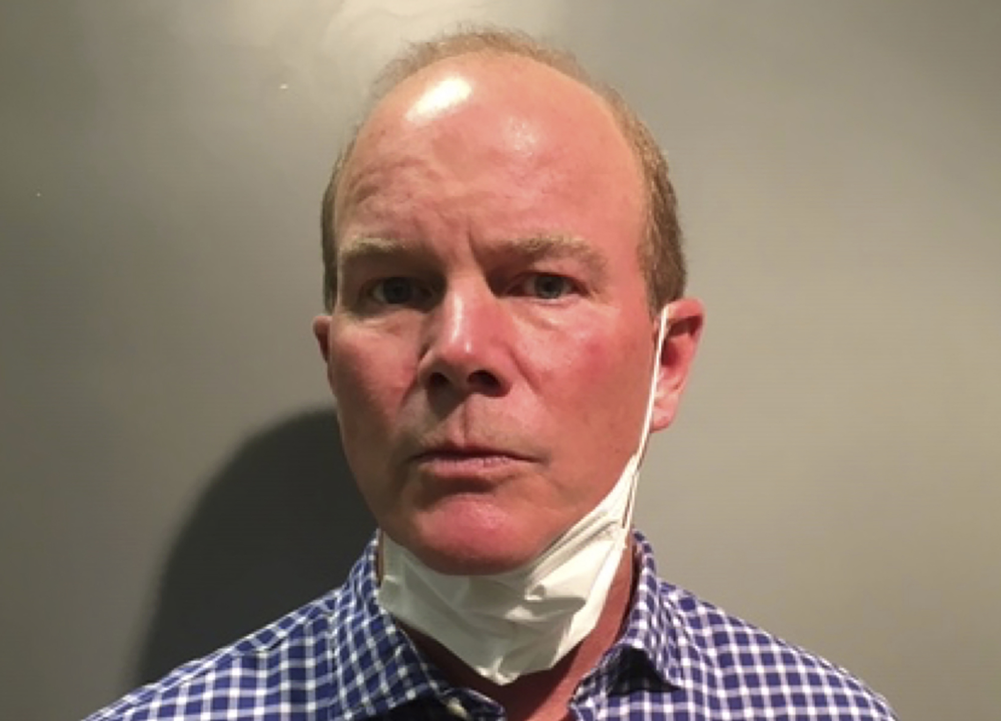 Police arrest man accused of assaulting people posting signs