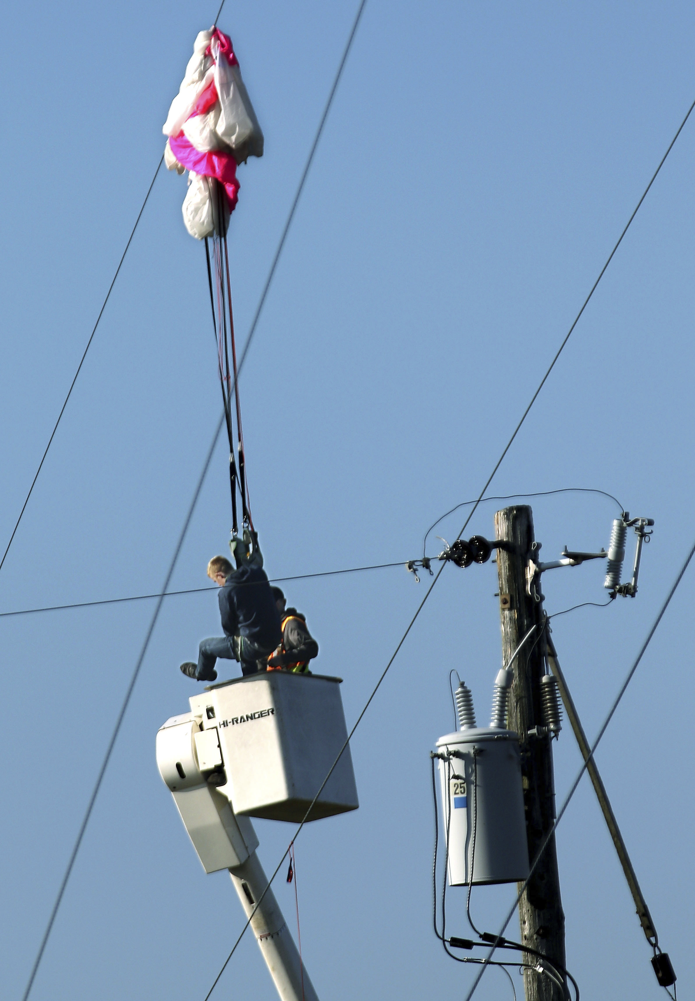 Illegal BASE jumper calls police after cell tower mishap