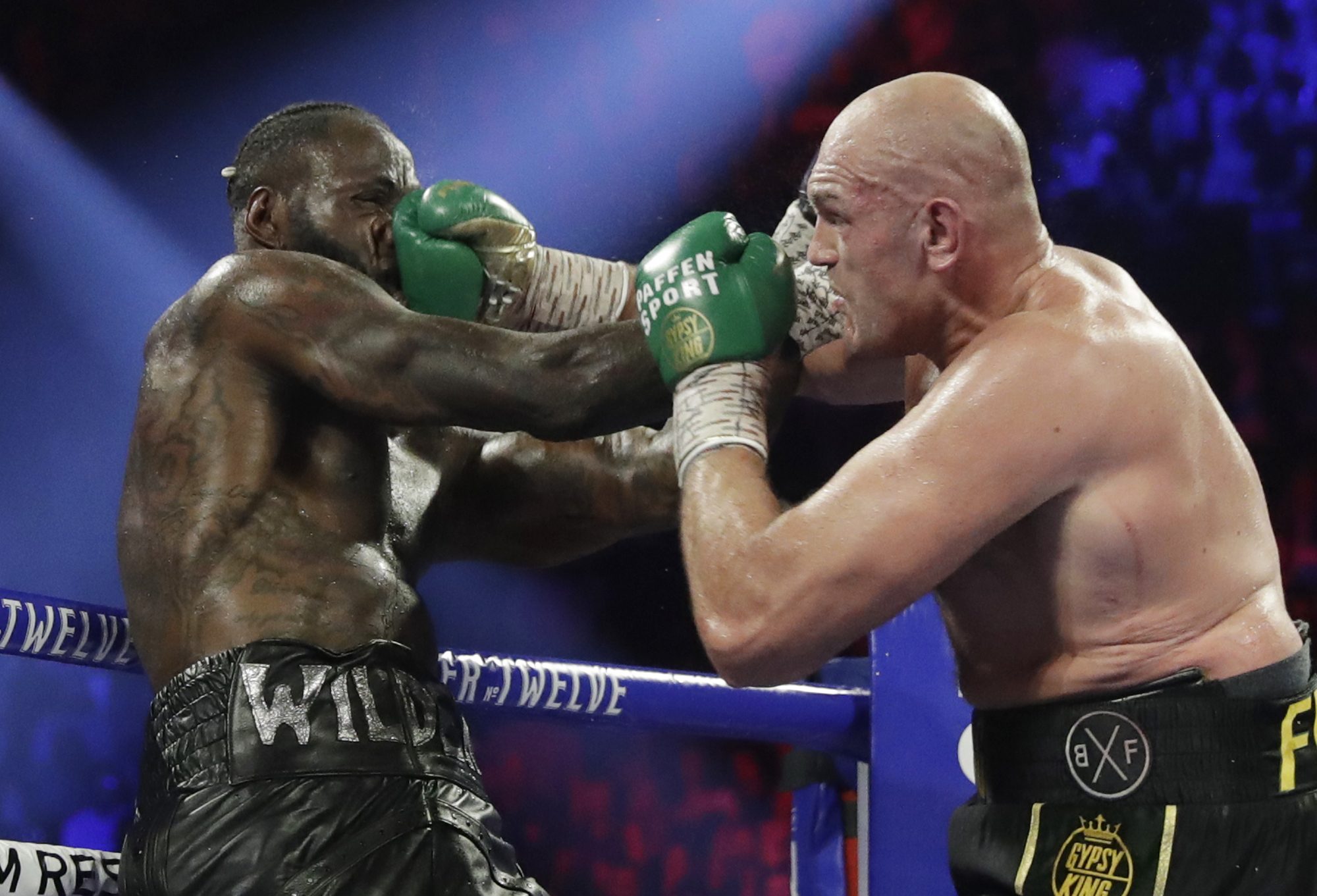 Fury wins in stunning stoppage of Wilder in heavyweight tilt