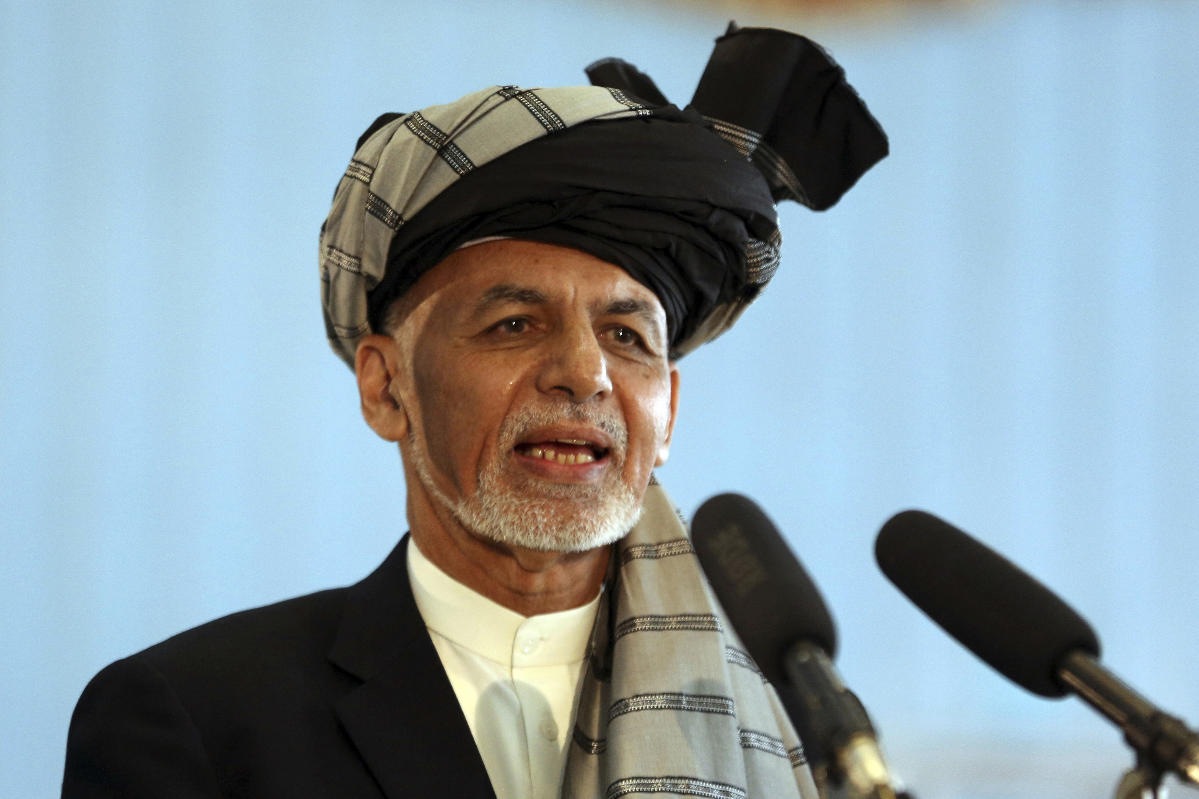 Afghan president: 3 Taliban released for held US, Australian